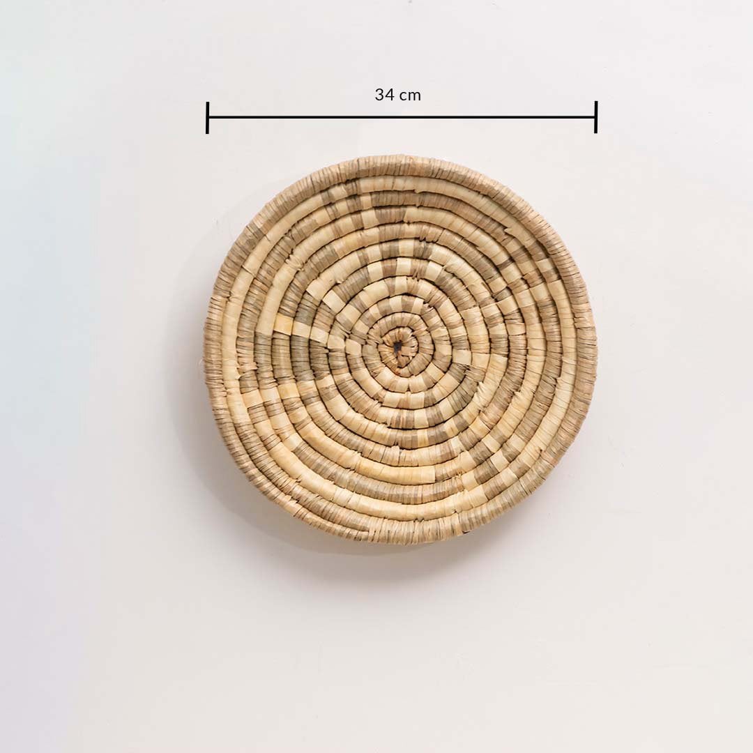 Natural wall basket measuring 34 cm diameter ideal for wall decoration and sustainable bohemian home styling.