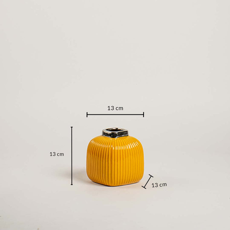 Yellow ribbed ceramic mini vase shown with 13 cm height and 13 cm width offering a clear accurate size reference.