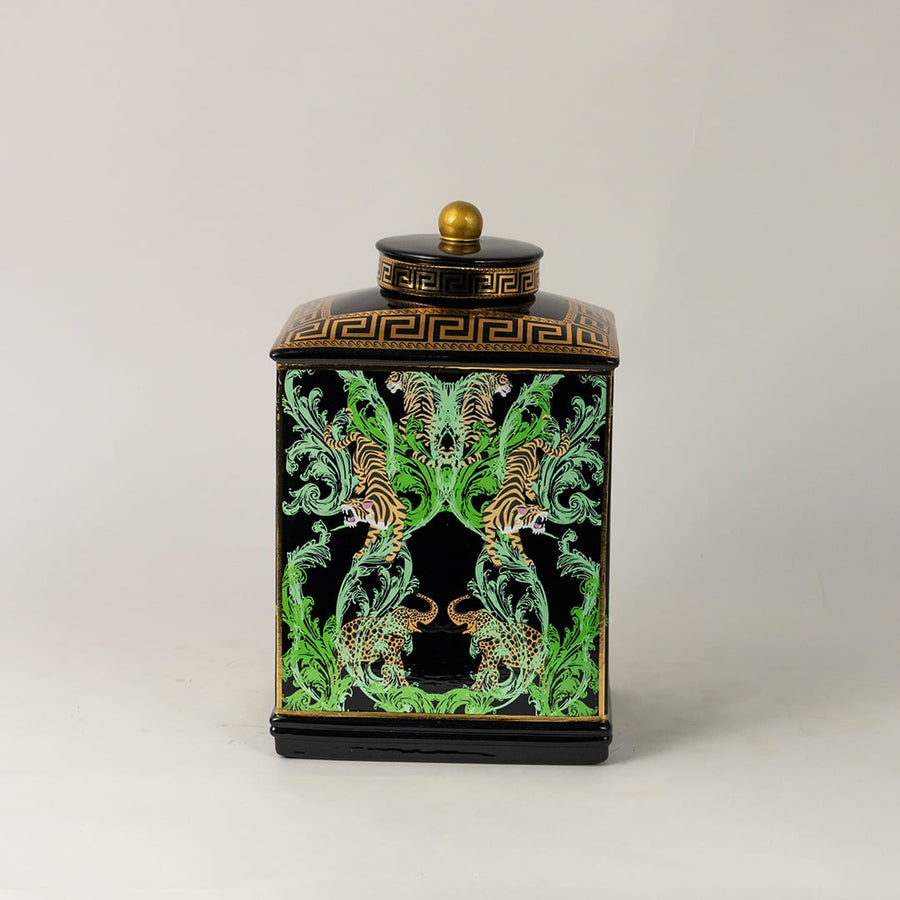 Black ceramic jar against white background showcasing intricate hand-painted tiger motifs and gold accents.