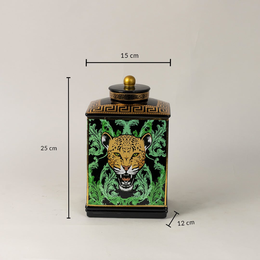 Black ceramic jar measuring 25 cm in height and 15 cm in width featuring gold lid and leopard motif.