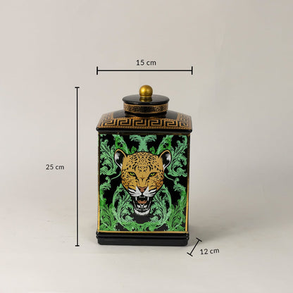 Black ceramic jar measuring 25 cm in height and 15 cm in width featuring gold lid and leopard motif.