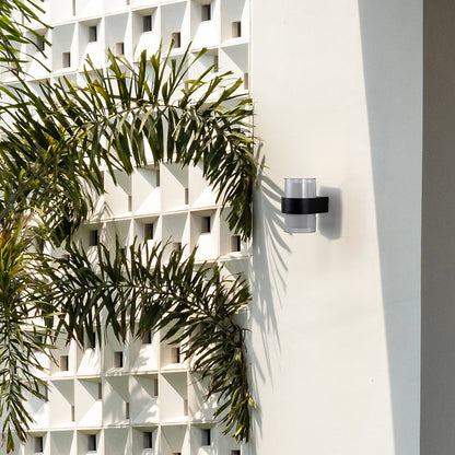 Stylish black and white wall light mounted on wall enhancing modern interiors with functional design and diffused soft glow.