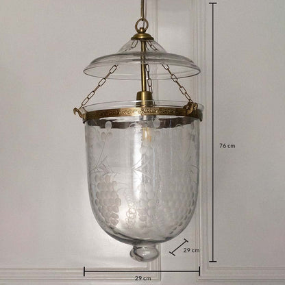 Dimension image of clear hammered glass and antique brass pendant light showing 70 cm height and 23 cm width.