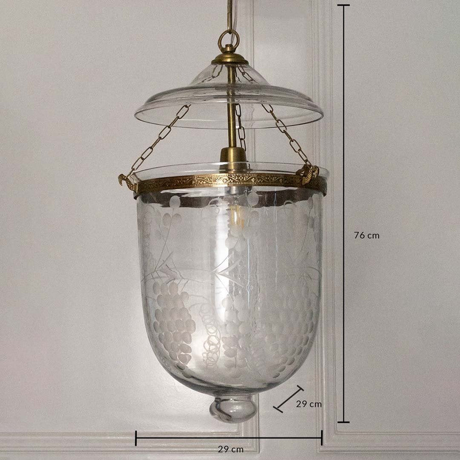 Dimension image of clear hammered glass and antique brass pendant light showing 70 cm height and 23 cm width.