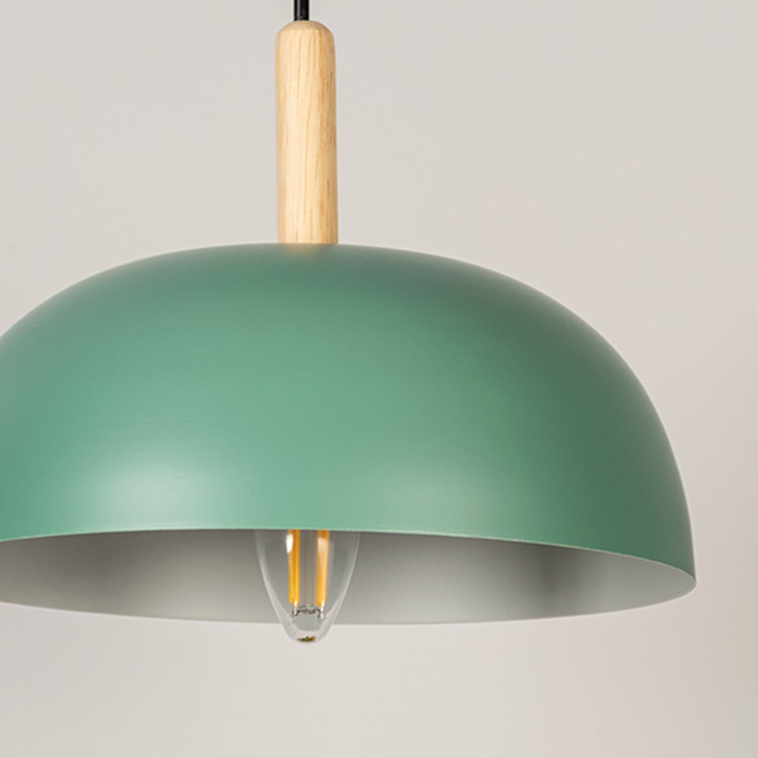 Closeup of green dome pendant ceiling light with wooden accent showing matte finish for dining kitchen and cafe modern lighting decor.