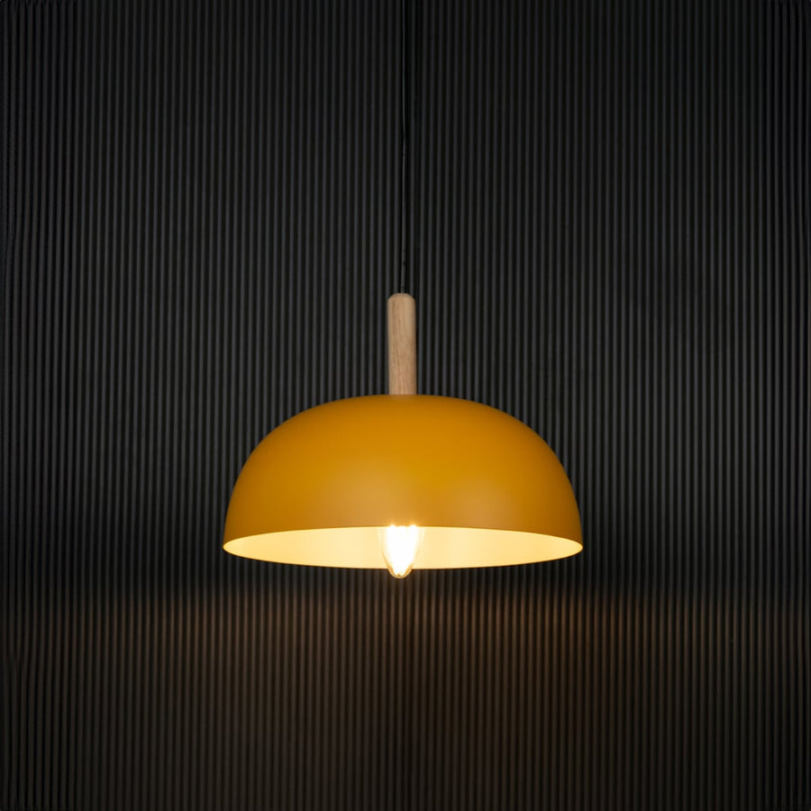 Yellow dome pendant light with wooden top displayed on black background is contemporary ceiling lighting for stylish home decor.