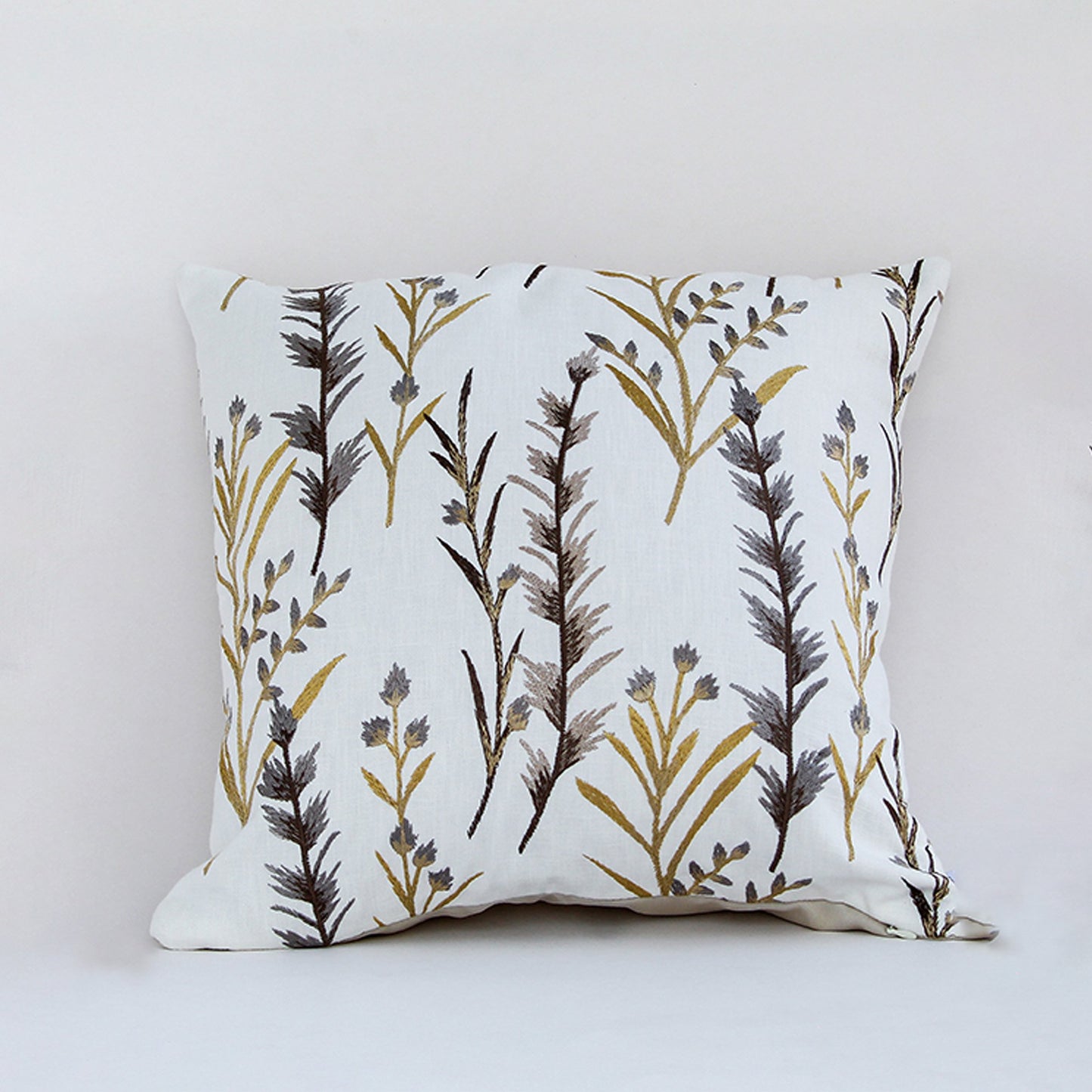 White cotton cushion cover with golden botanical branch print for sofa couch bedroom and modern home decor styling.