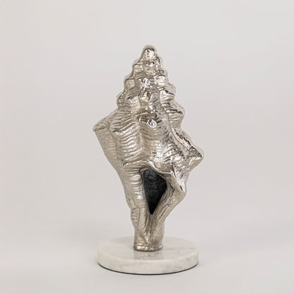 Artistic shell decor piece in silver finish for table decor or shelf styling contemporary home placement white background.