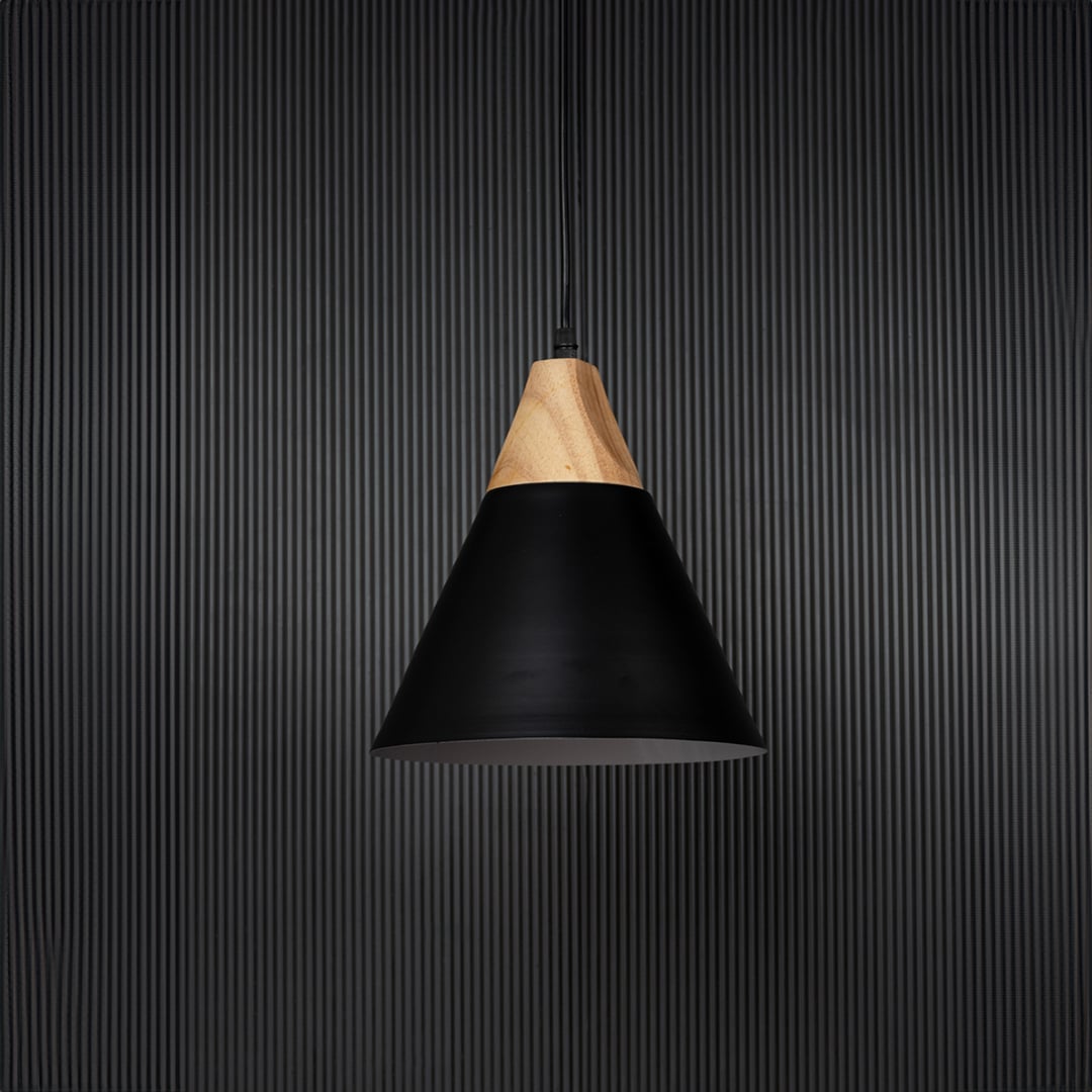 Black pendant light with wooden top and metal shade shown off on black background for modern dining room lighting.