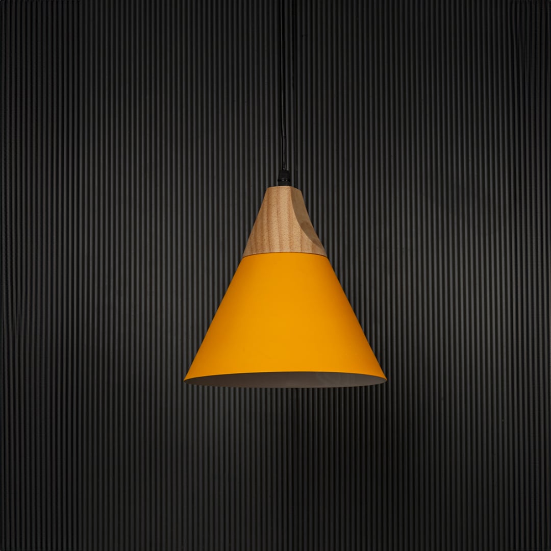 Yellow pendant light with conical metal shade and wooden top shown off on black background for modern home decor.