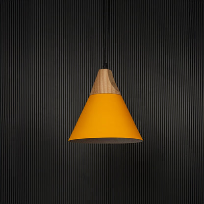 Yellow pendant light with conical metal shade and wooden top shown off on black background for modern home decor.