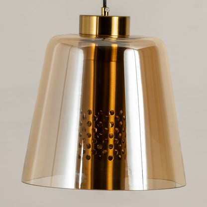 Closeup of gold metallic pendant light showing polished reflective surface and perforated detail ideal for stylish contemporary interiors.