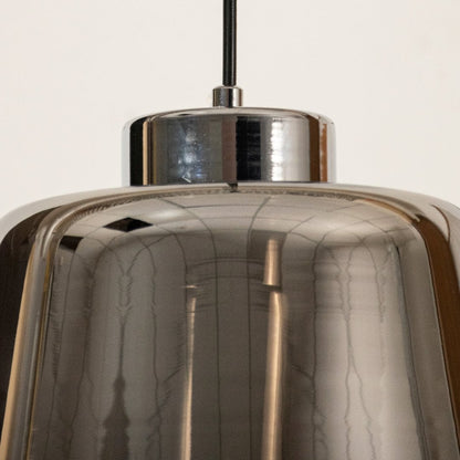 Closeup of smoked grey glass pendant light showing its reflective surface and modern tapered design ideal for stylish contemporary decor.