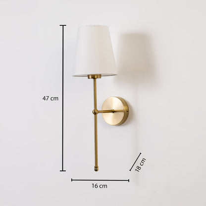 Gold wall light with white shade measuring 47 cm height 16 cm width and 18 cm depth shown with dimension lines.