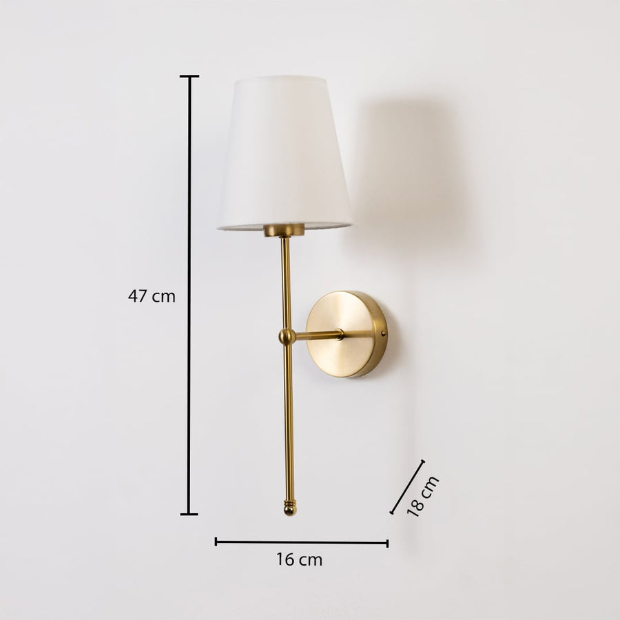 Gold wall light with white shade measuring 47 cm height 16 cm width and 18 cm depth shown with dimension lines.