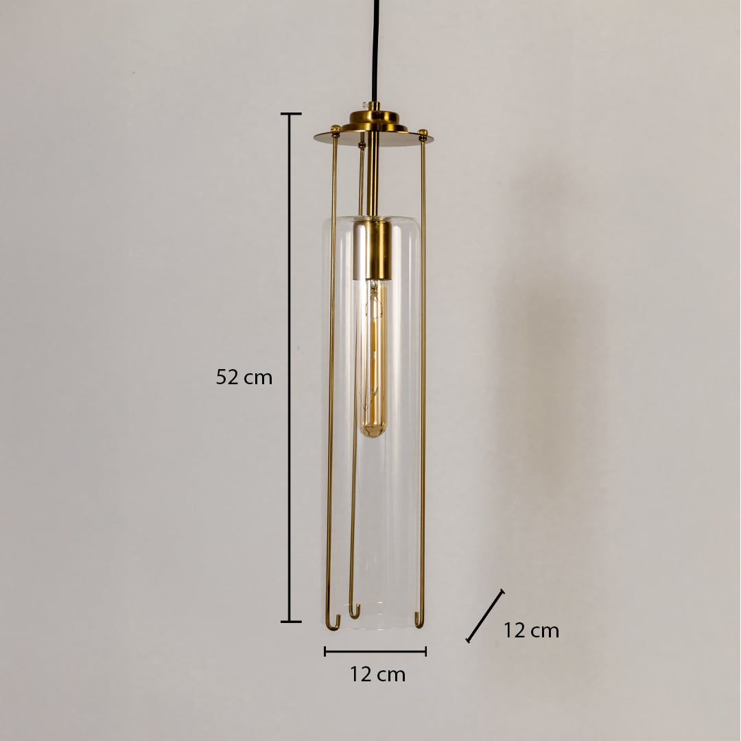 Clear glass pendant light with dimensions labeled 52 cm height and 12 cm width showing its slim cylindrical body and brass frame details.