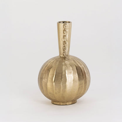Golden designer vase placed on a clean white backdrop showing its handcrafted texture and unique top structure