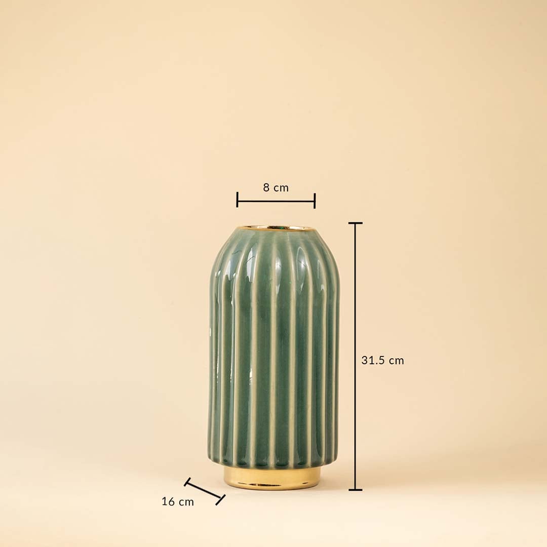 Green ribbed ceramic vase showing 22 cm height and 12 cm width dimensions suitable for console table or shelf decor placement.