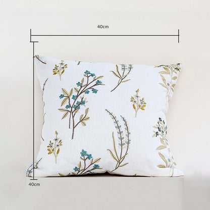 A white background dimensions image showing a floral embroidered cushion measuring 40 cm by 40 cm with botanical patterns clearly visible across the front surface.