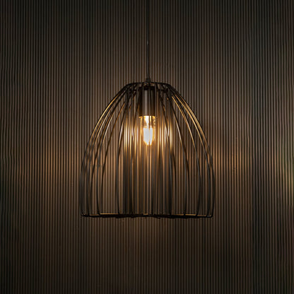 Elegant black cage pendant light illuminated on dark background highlighting artistic industrial design and warm modern lighting.
