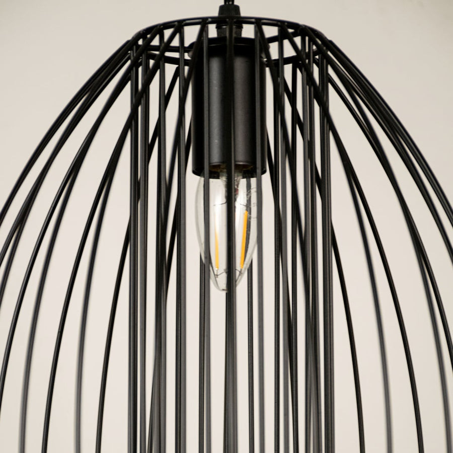 Close view of black cage pendant light showing detailed metal rods and clean craftsmanship with sleek industrial modern finish.