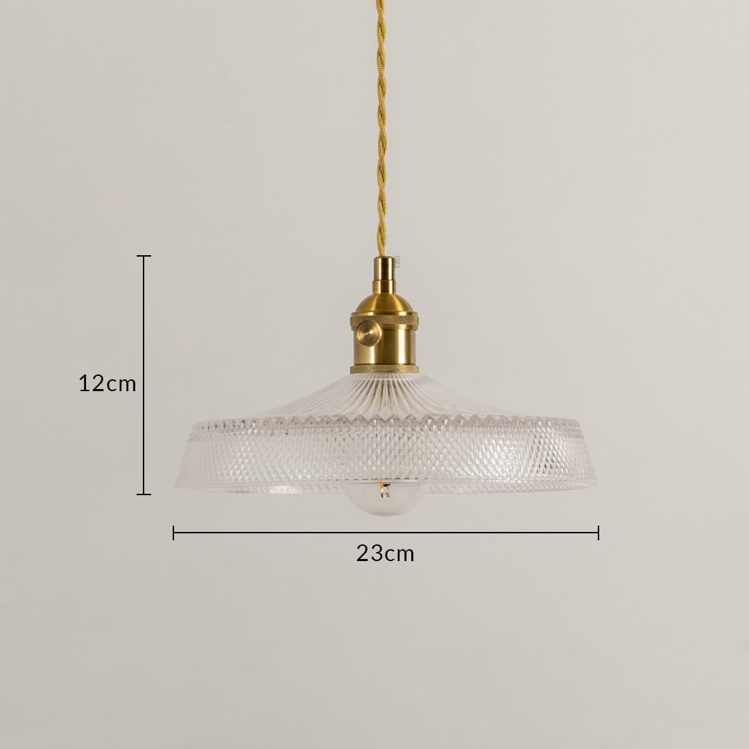 Dimension image of textured clear glass pendant light with brass holder showing 12 cm height and 23 cm width.