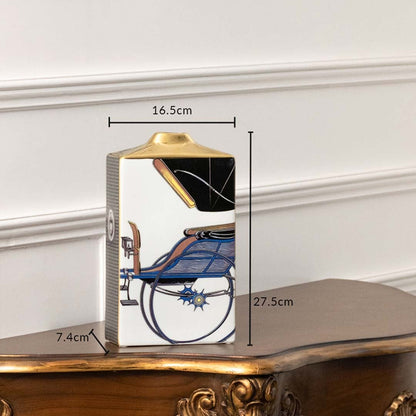 White rectangular ceramic jar with blue carriage artwork in a front view measuring 14.5 cm width and 27.5 cm height ideal for refined décor accents.