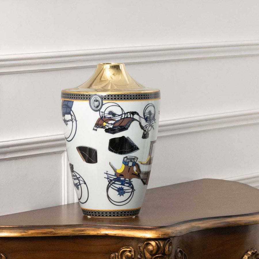 White ceramic jar with blue and gold floral artwork in a front view perfect for artistic décor styling and elegant interior placement.