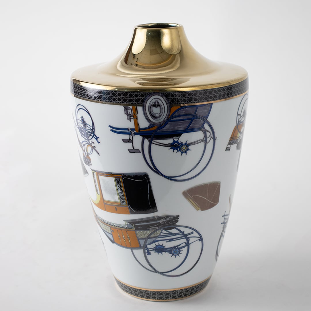 White ceramic jar with abstract blue artwork in a front view perfect for bold décor styling and modern console display.