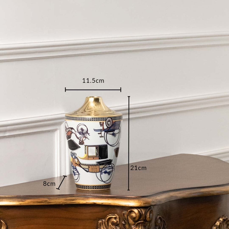 White ceramic jar with blue carriage artwork in a front view measuring 11.5 cm width and 21 cm height perfect for stylish tabletop décor.