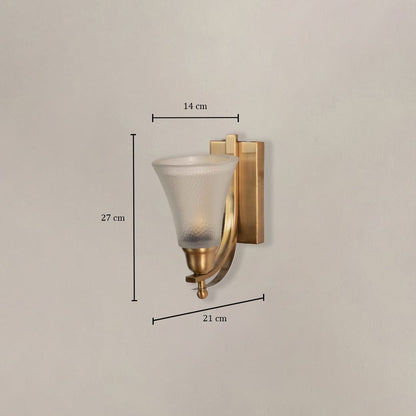 Contemporary brass wall sconce with frosted glass shade measuring 27cm height 14cm shade width and 21cm projection from wall.