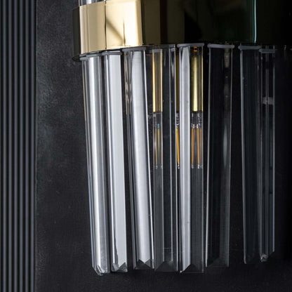 Detailed closeup capturing the refined edges of the crystal rods and the smooth metallic band showing the high end craftsmanship of the design.