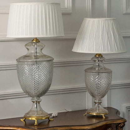 Pair of elegant crystal glass table lamps with pleated shades turned off highlighting premium materials and timeless design for luxurious home decor.