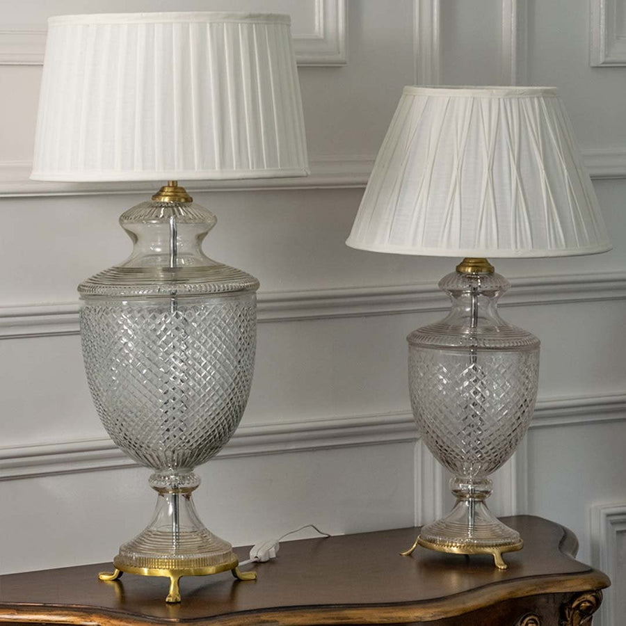 Pair of elegant crystal glass table lamps with pleated shades turned off highlighting premium materials and timeless design for luxurious home decor.