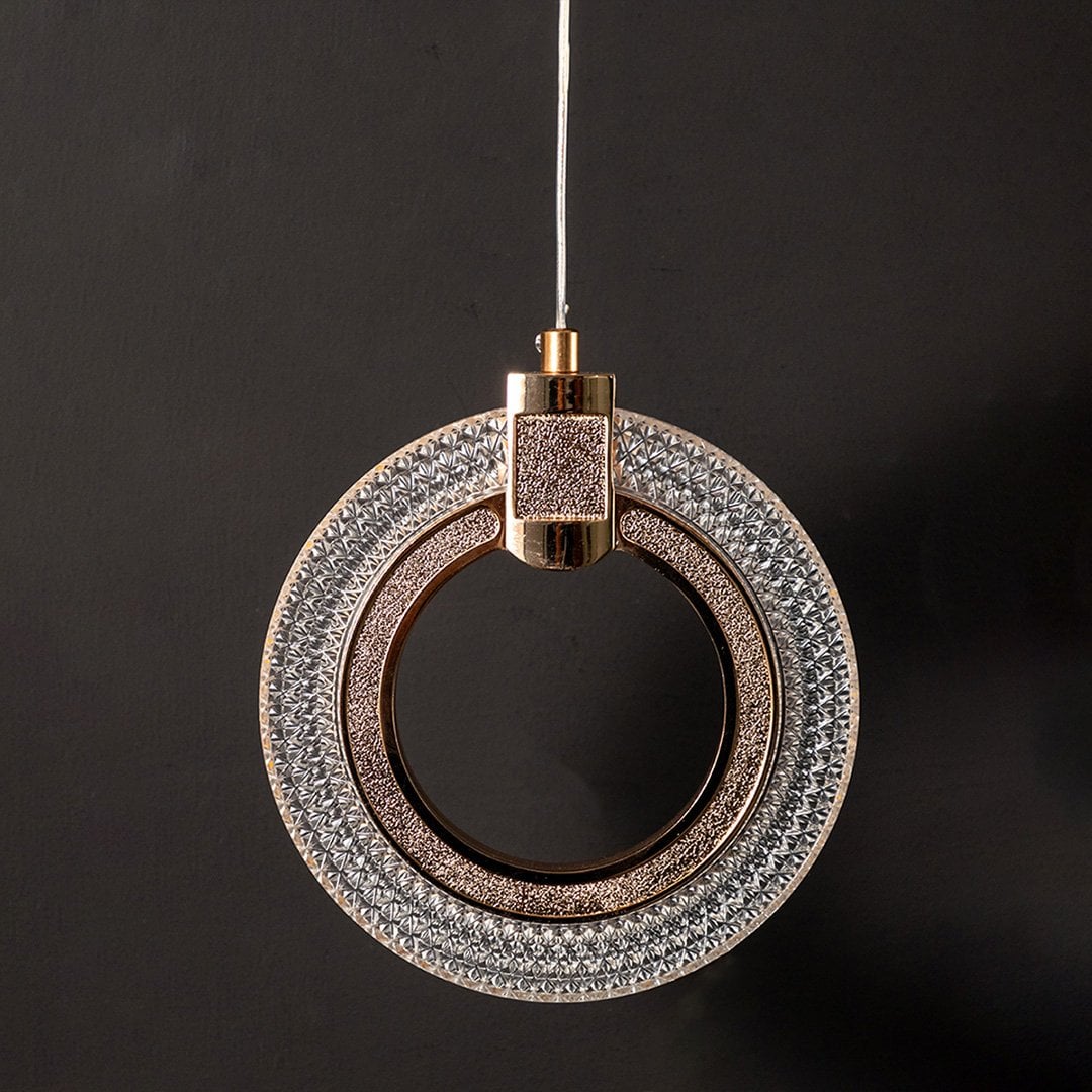 Detailed closeup of gold wall light bracket and mount highlighting metallic finish and premium quality.