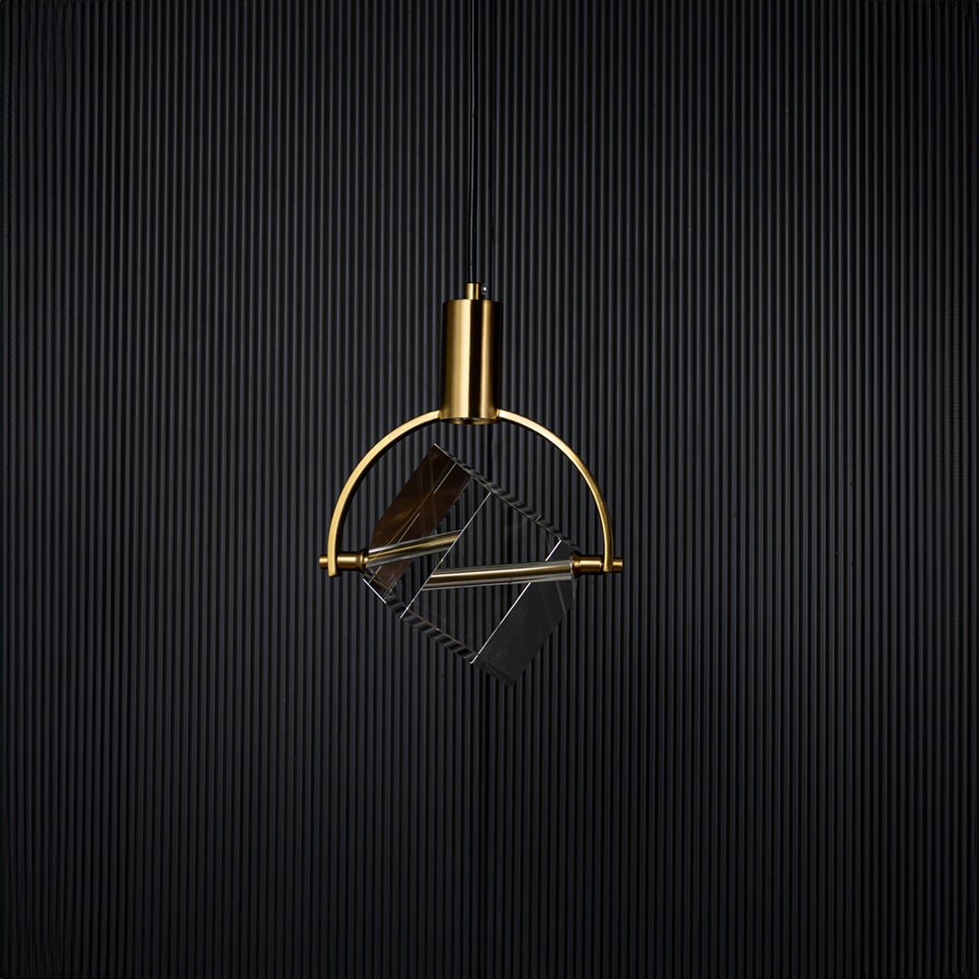 Crystal cube pendant light bulb off on black background with golden frame and clear cube design for home decor.