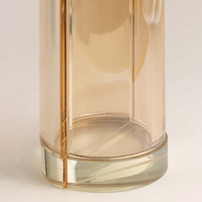 Macro view of amber vase cut and polish showing amber vase material and craftsmanship detail.
