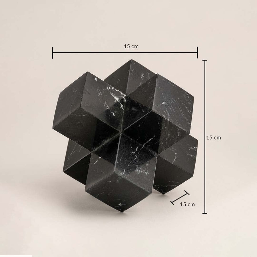 Black marble geometric sculpture showing 15 cm height width and depth dimensions for precise display.