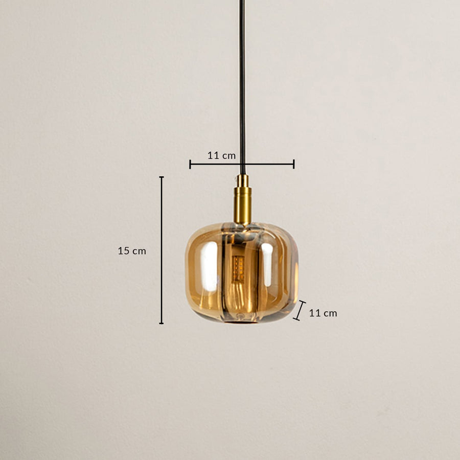 Dimensions of the amber pendant light 15 cm height and 11 cm width designed with amber glass and gold accents for a modern elegant touch.
