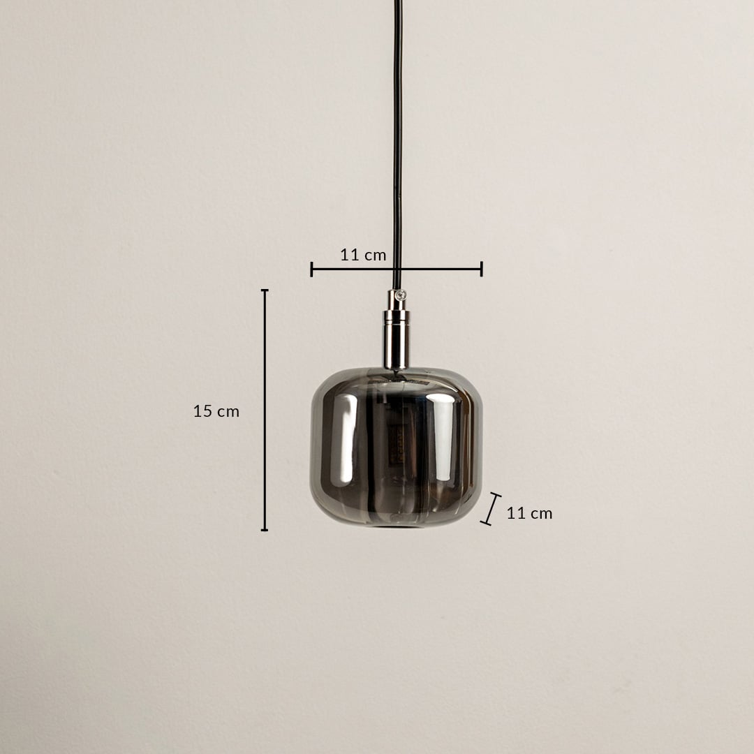 Dimensions of the amber pendant light 15 cm height and 11 cm width are designed with a sleek glass shade for modern interiors.