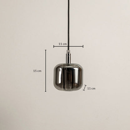 Dimensions of the amber pendant light 15 cm height and 11 cm width are designed with a sleek glass shade for modern interiors.