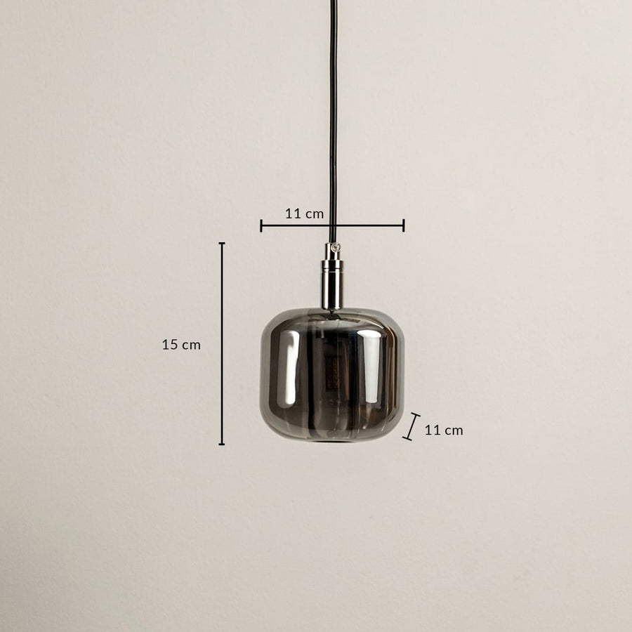 Dimensions of the amber pendant light 15 cm height and 11 cm width are designed with a sleek glass shade for modern interiors.