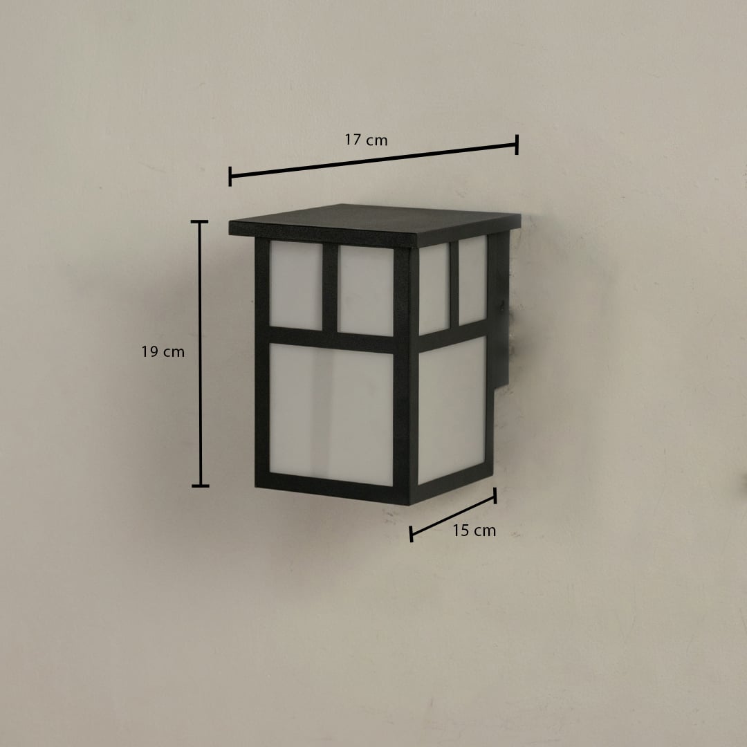 Outdoor wall light showing 19 cm height 17 cm width and 15 cm depth with a modern geometric structure.