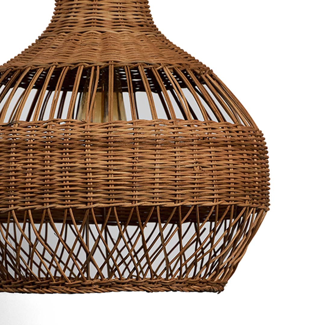 Closeup of rattan pendant light displaying detailed weaving and smooth curved dome for a boho natural look.