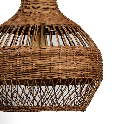 Closeup of rattan pendant light displaying detailed weaving and smooth curved dome for a boho natural look.