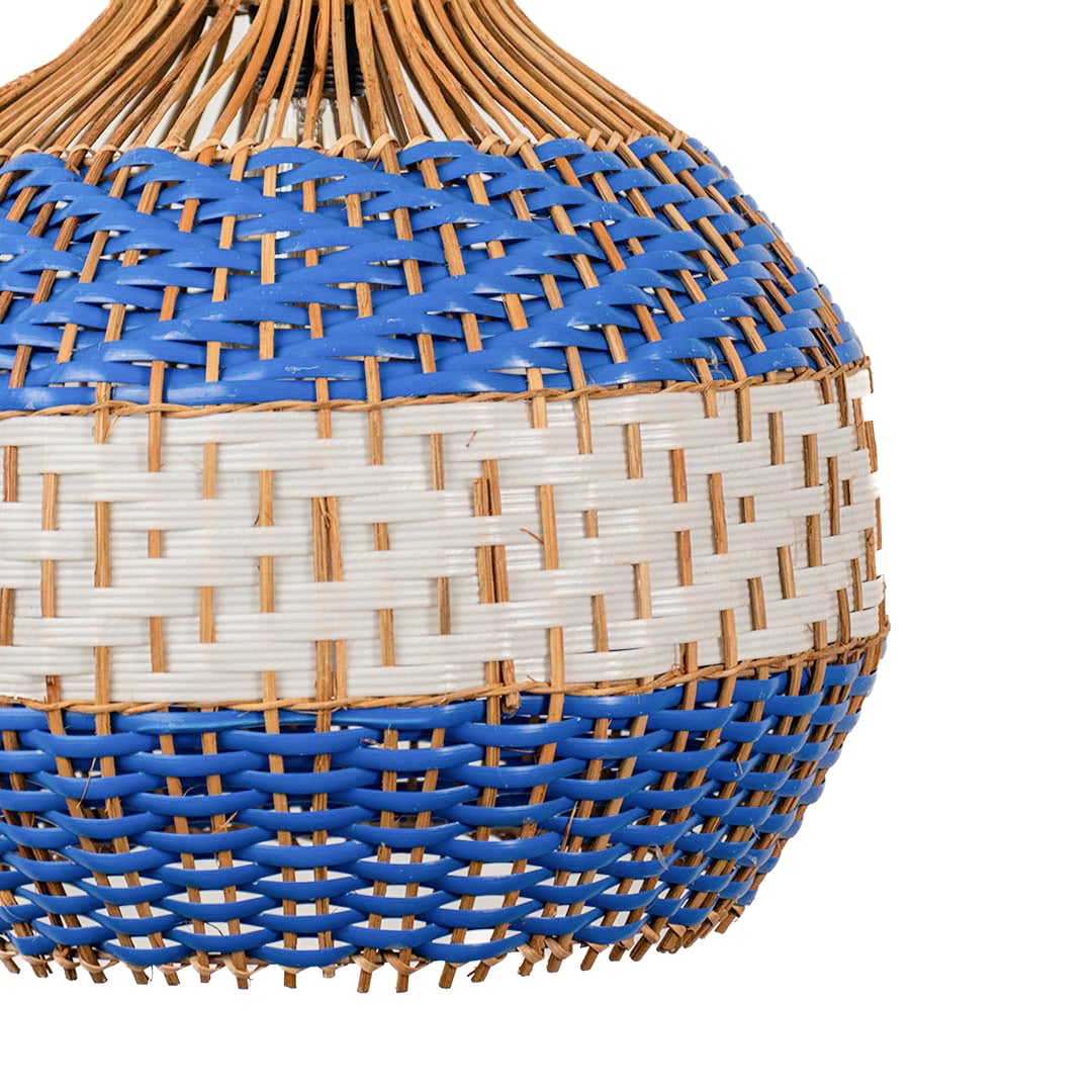 Closeup of blue and beige woven rattan pendant light showcasing handcrafted texture and coastal charm.
