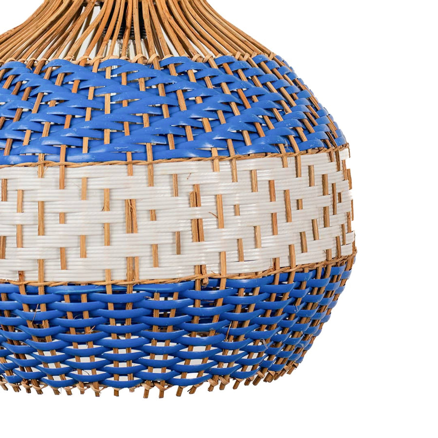 Closeup of blue and beige woven rattan pendant light showcasing handcrafted texture and coastal charm.