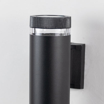 Closeup of black wall light showing fine texture smooth finish and transparent accents that enhance modern architectural appeal.