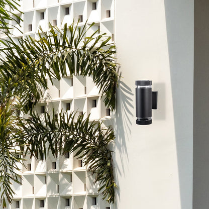 Stylish wall-mounted black light fixture blending function and form creating a refined modern ambiance for indoor or outdoor spaces.