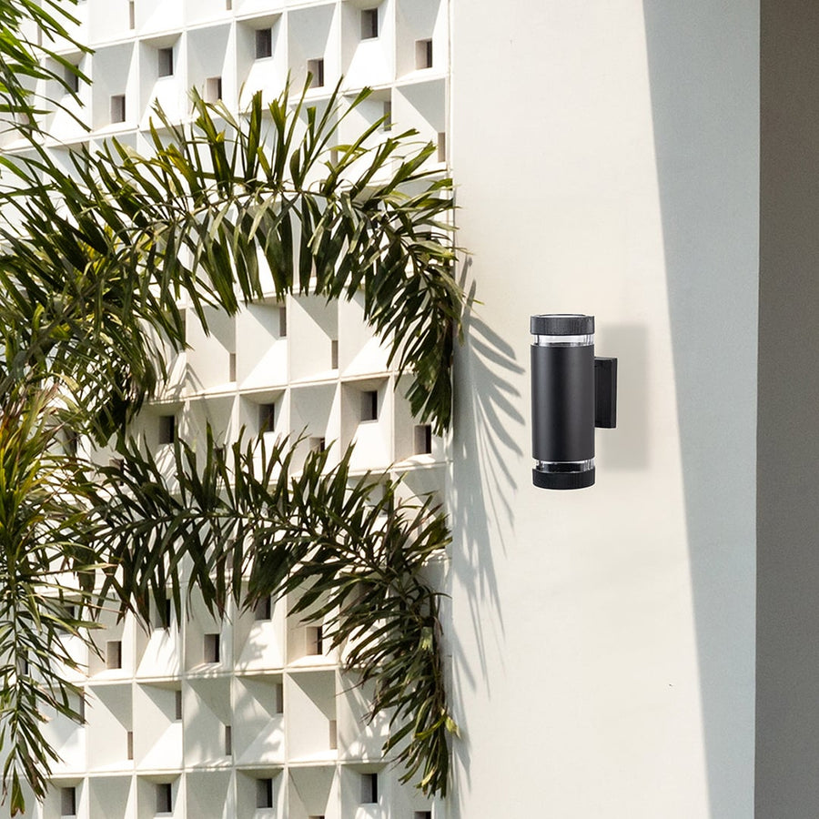 Stylish wall-mounted black light fixture blending function and form creating a refined modern ambiance for indoor or outdoor spaces.